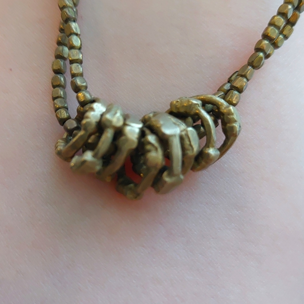 Fun brass color beads necklace.